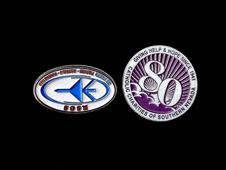 Two organizational lapel pin logos on black background: left shows blue arrow emblem, right displays purple and white circular seal with shells